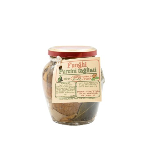 Funghi porcini tagliati in olio d'oliva